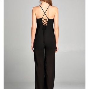 NWOT Melanie Jumpsuit. The Sweetest You Boutique